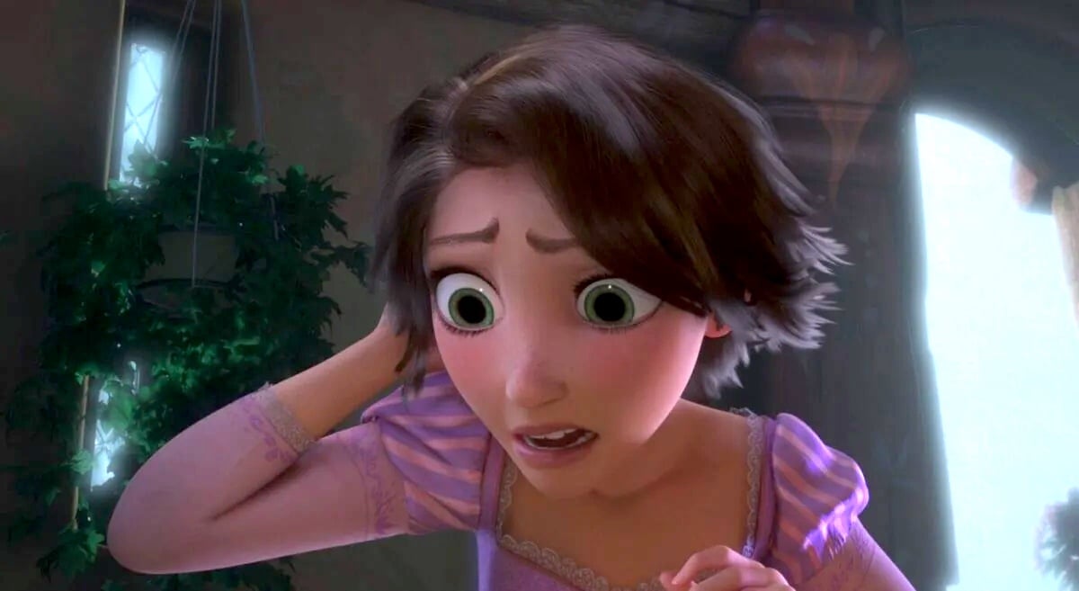 Rapunzel shocked right after her hair is cut in Tangled. Image: Disney.