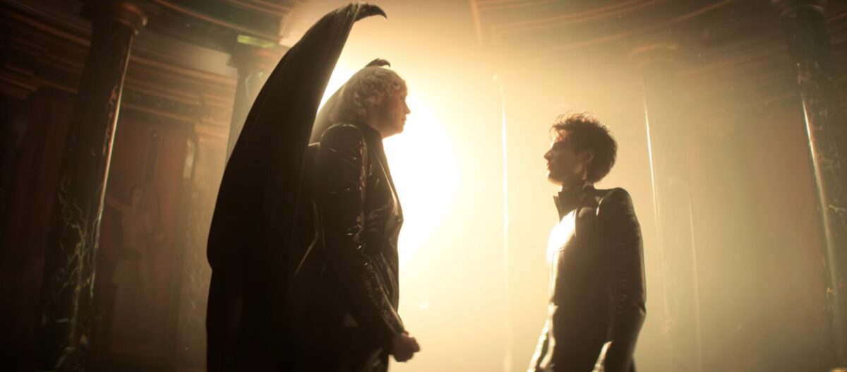 Lucifer and Morpheus face each other with sunlight behind them.