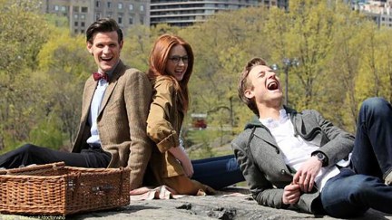 Amy Pond, the Doctor, and Rory Williams laughing together