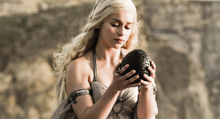 Daenerys Targaryen with one of the three dragon eggs gifted to her at her wedding