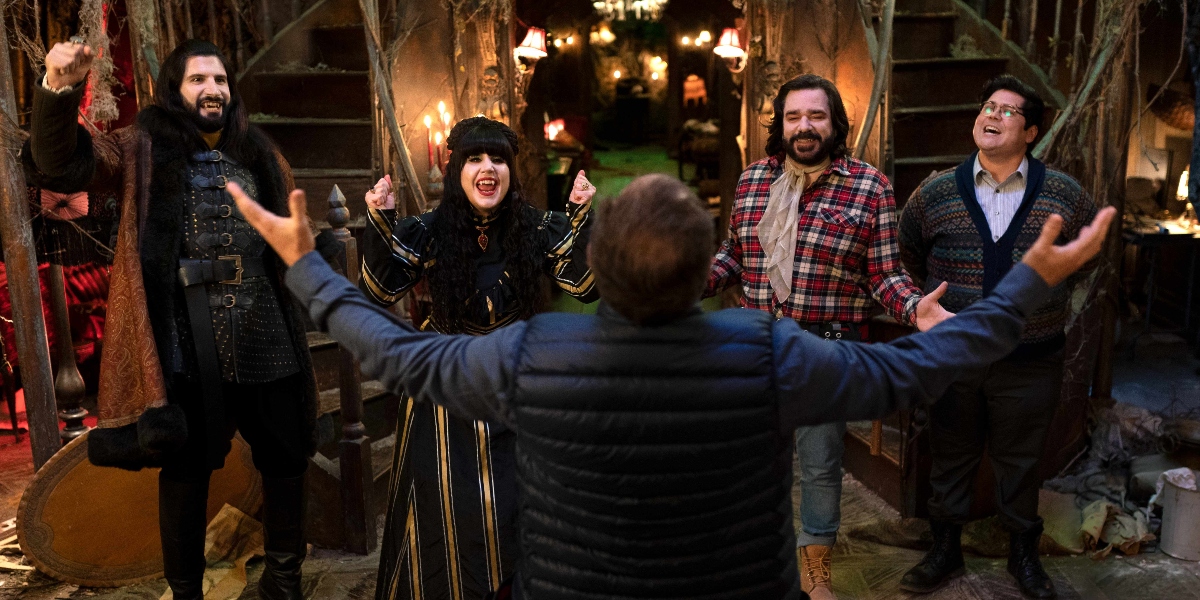 The crew all cheering for Go Flip Yourself on 'What We Do In the Shadows'
