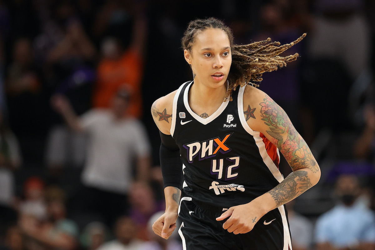 Brittney Griner jogs on the court during a basketball game.