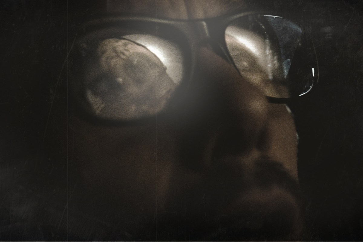 ellison watching a tape in Sinister