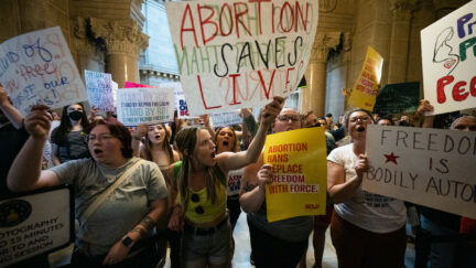 Abortion rights protesters gather in the Indiana statehouse.