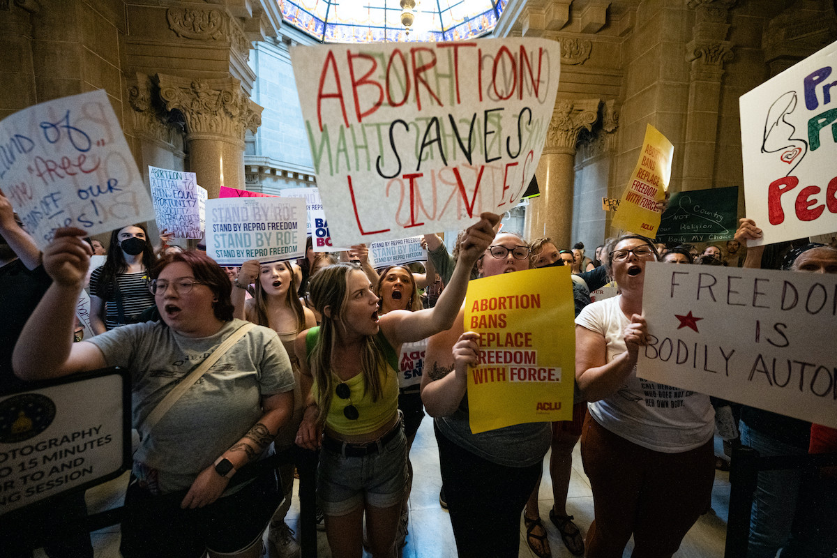 Abortion rights protesters gather in the Indiana statehouse.