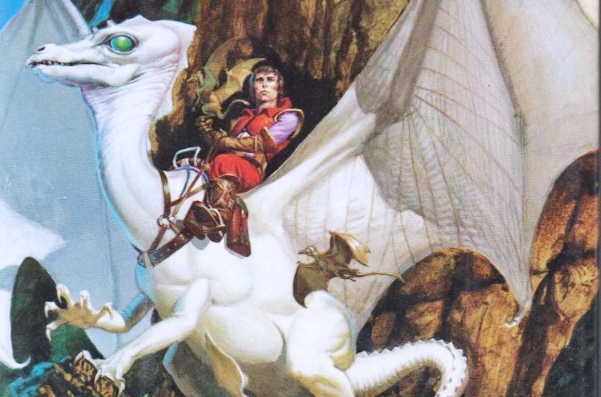 Illustration of a man riding a white dragon.