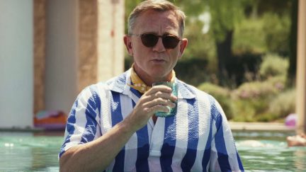 Daniel Craig as Benoit Blanc in a pool in Glass Onion: A Knives Out Mystery