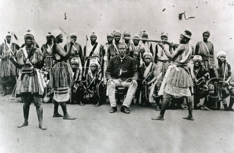 A photograph from the eighteen hundreds of Agozie sparring in front of an audience.