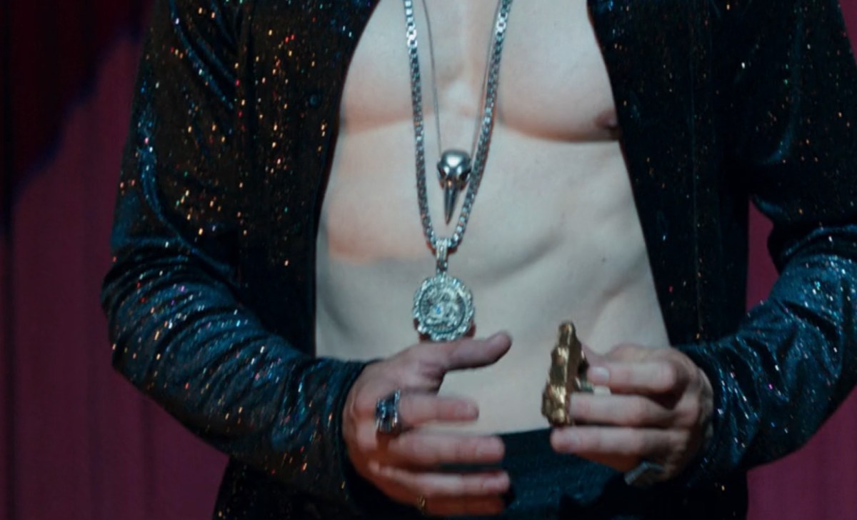 Close up of Donny Blaze's necklaces in She-Hulk, including a Khonshu skull.