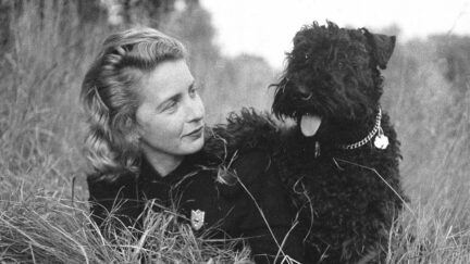 Portrait of Margaret Wise Brown and her dog.