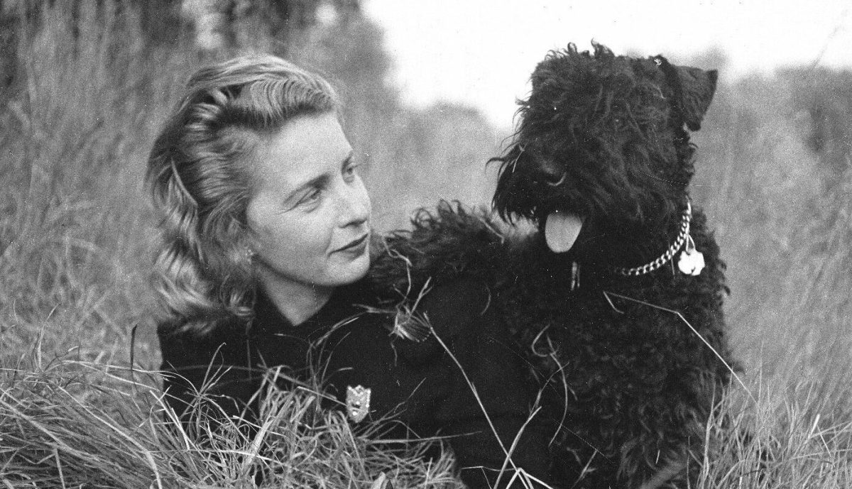 Portrait of Margaret Wise Brown and her dog.