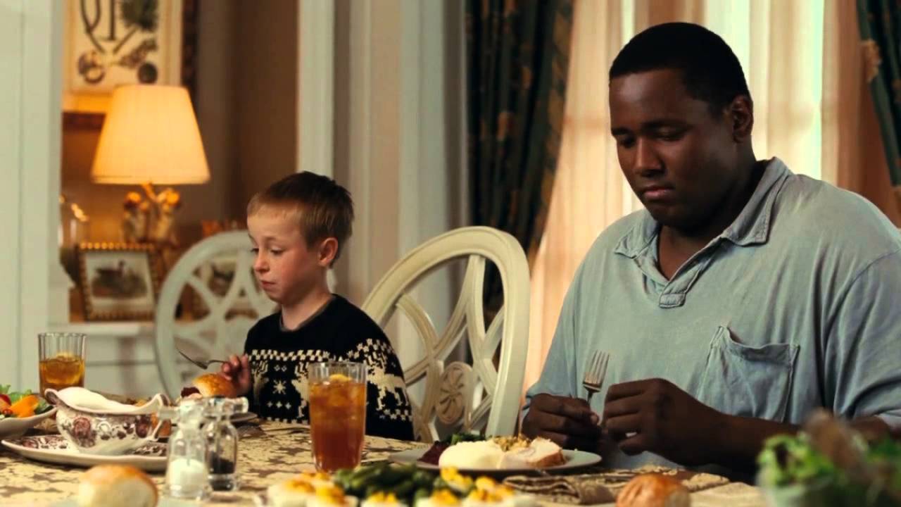 Quentin Aaron as Mike and Jae Head as Sean in The Blind Side