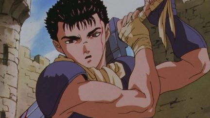 Guts hoisting a massive sword over his back in 