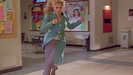 buffy running in her teal coat in Buffy s2