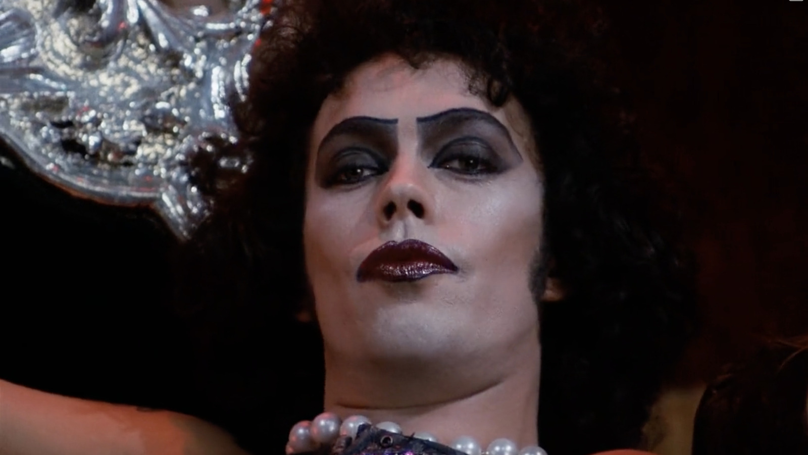 Frank-N-Furter (Tim Curry) being a baddie in 'The Rocky Horror Picture Show'