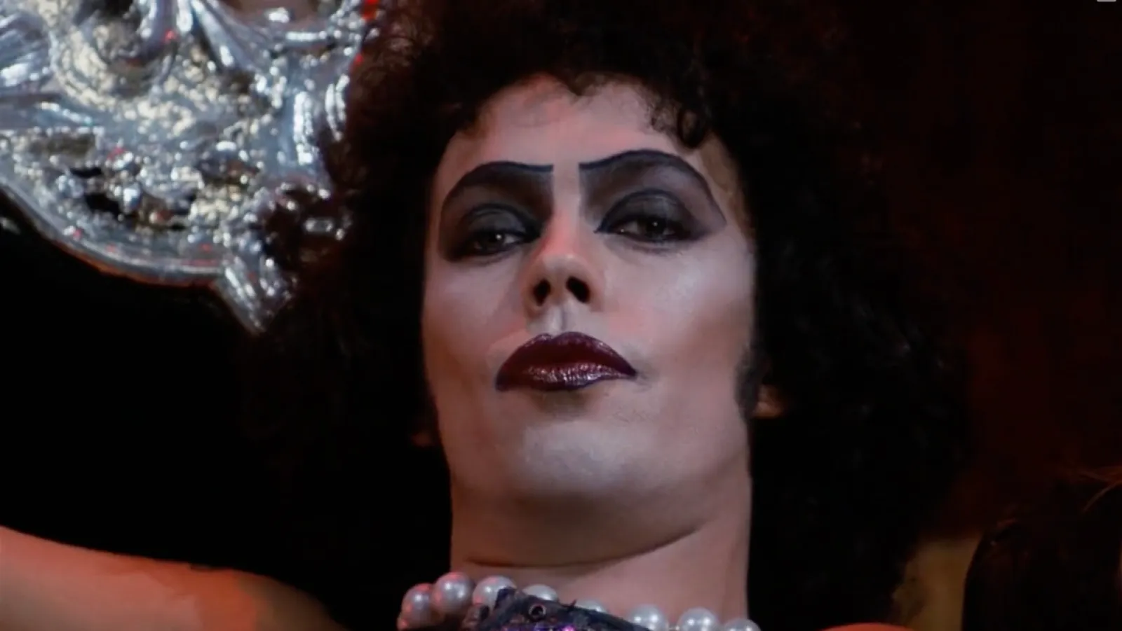 Frank-N-Furter (Tim Curry) being a baddie in 'The Rocky Horror Picture Show'