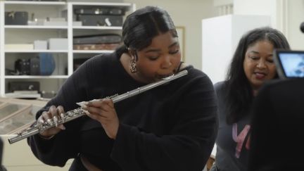 Lizzo playing flute in Library of Congress archives. Image: screencap from Washington Post.