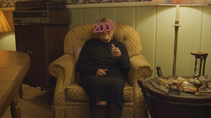 old woman giving thumbs up in V/H/S 99 trailer