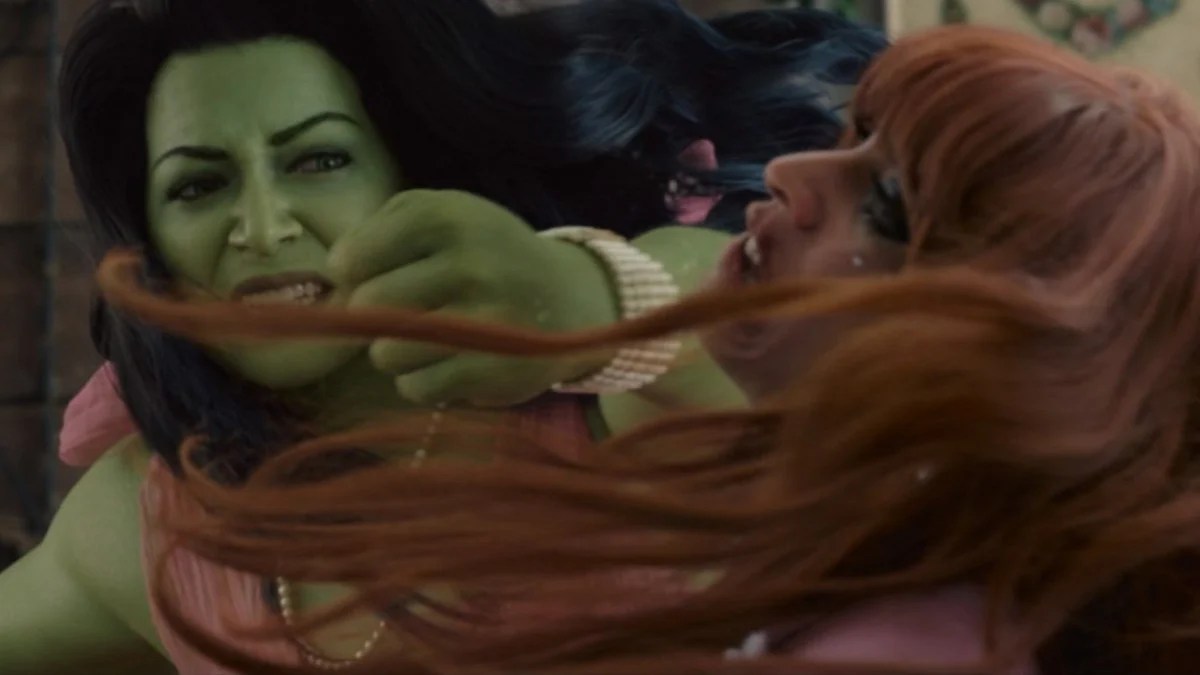 Close up of She-Hulk punching Titania in the face.