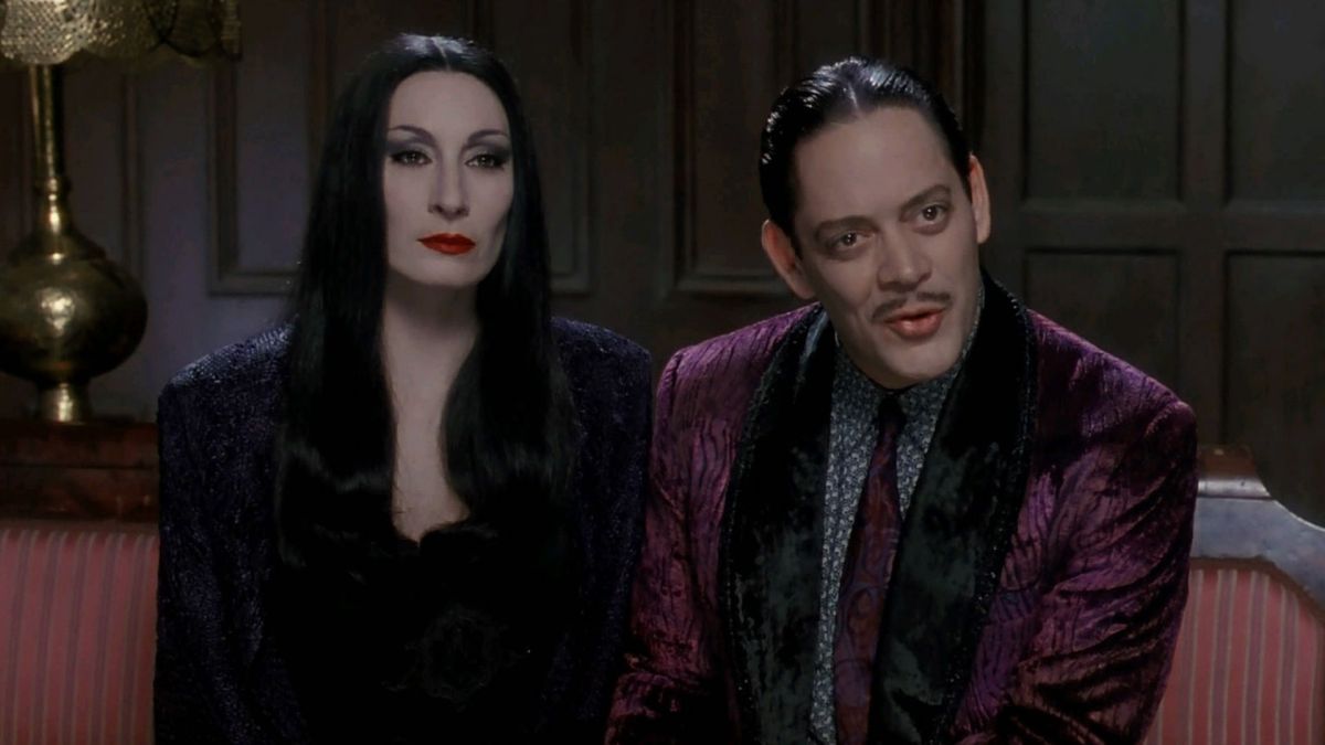 Anjelica Huston as Morticia and Raul Julia as Gomez in Addams Family Values