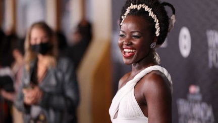 Lupita Nyong'o wears white at the Black Panther: Wakanda Forever world premiere.