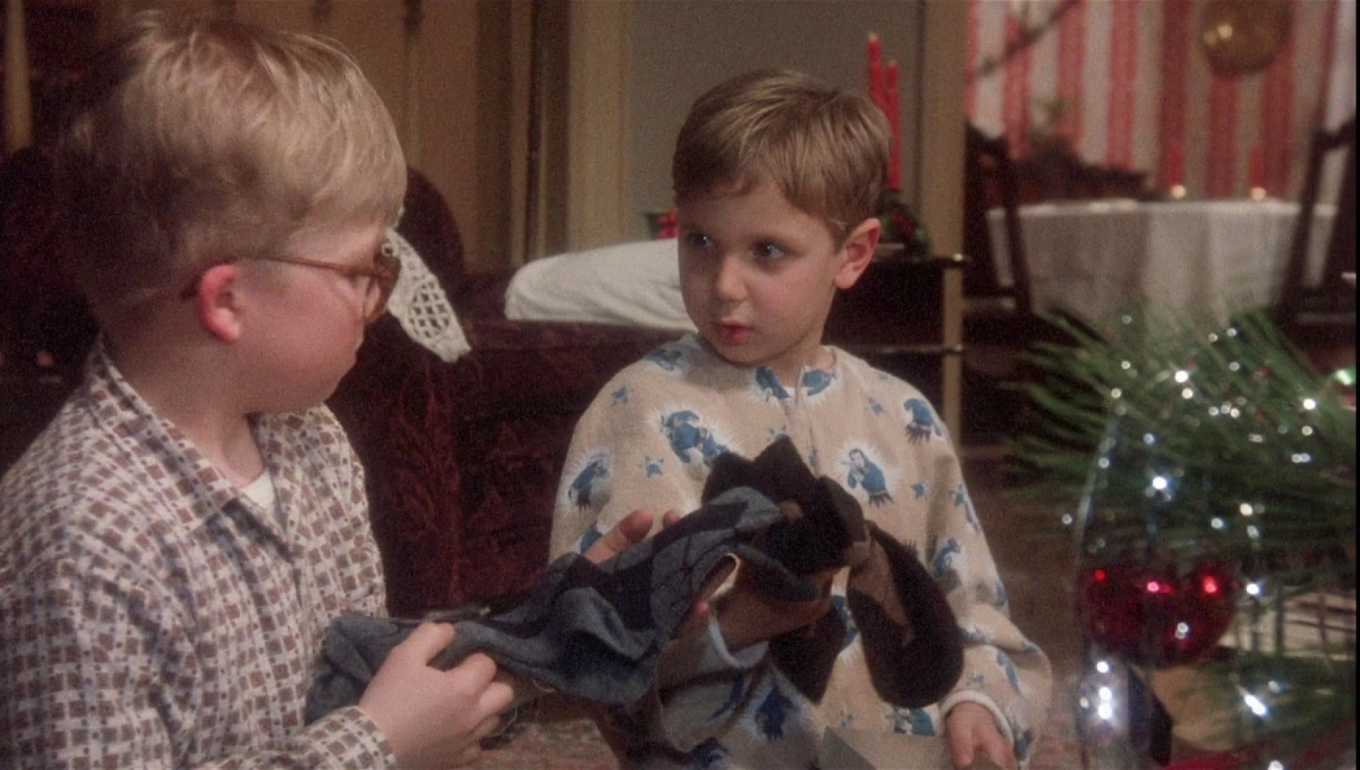 Peter Billingsley as Ralphie and Ian Petrella as Randy in A Christmas Story