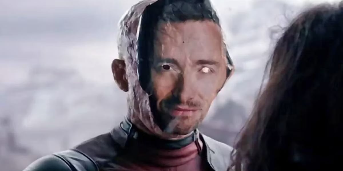 Ryan Reynolds in Deadpool wearing a Hugh Jackman Mask