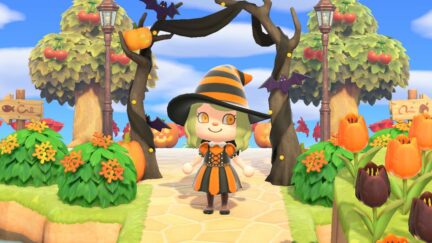 An animal crossing character wears a witch costume.