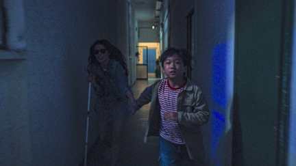 diana and chin running in Dark Glasses