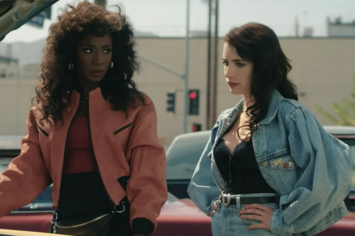 Angelica Ross as Rita and Emma Roberts as Brooke in AHS: 1984