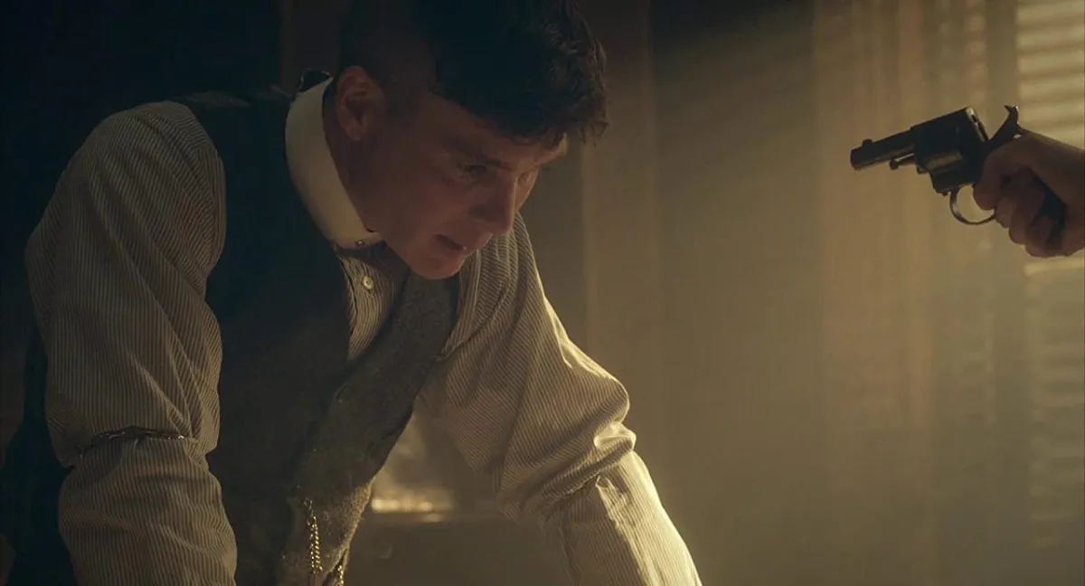 Tommy Shelby faced with a gun in Peaky Blinders