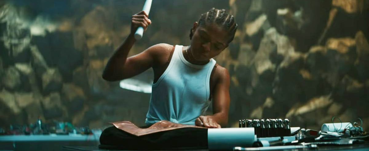 Riri Williams making her Ironheart suit in Wakanda Forever