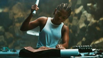 Riri Williams making her Ironheart suit in Wakanda Forever