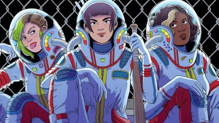 Cover art for the graphic novel Space Trash featuring three girls in spacesuits sitting on the surface of the moon, leaning against a chain link fence