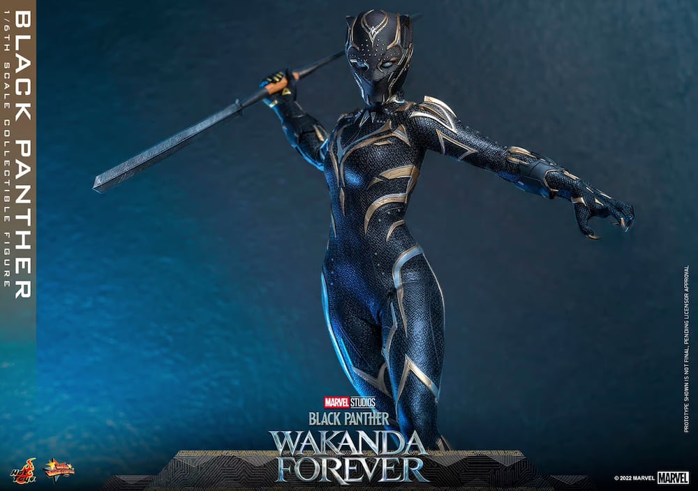 A highly detailed posable figure of Black Panther in the style of Wakanda Forever, holding a spear with arms outstretched