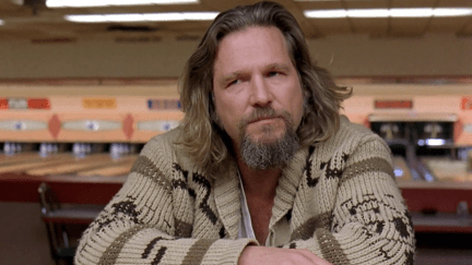 Jeff Bridges leaning against the bar in The Big Lebowski