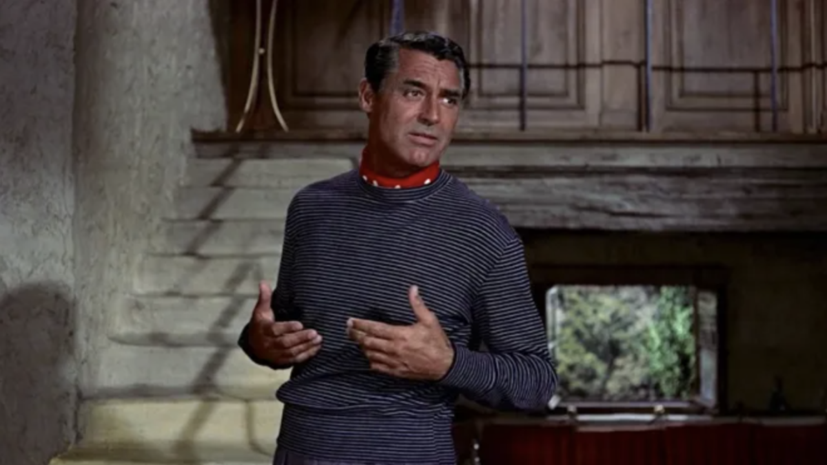 Carey Grant in a striped sweater and red necktie in To Catch a Thief