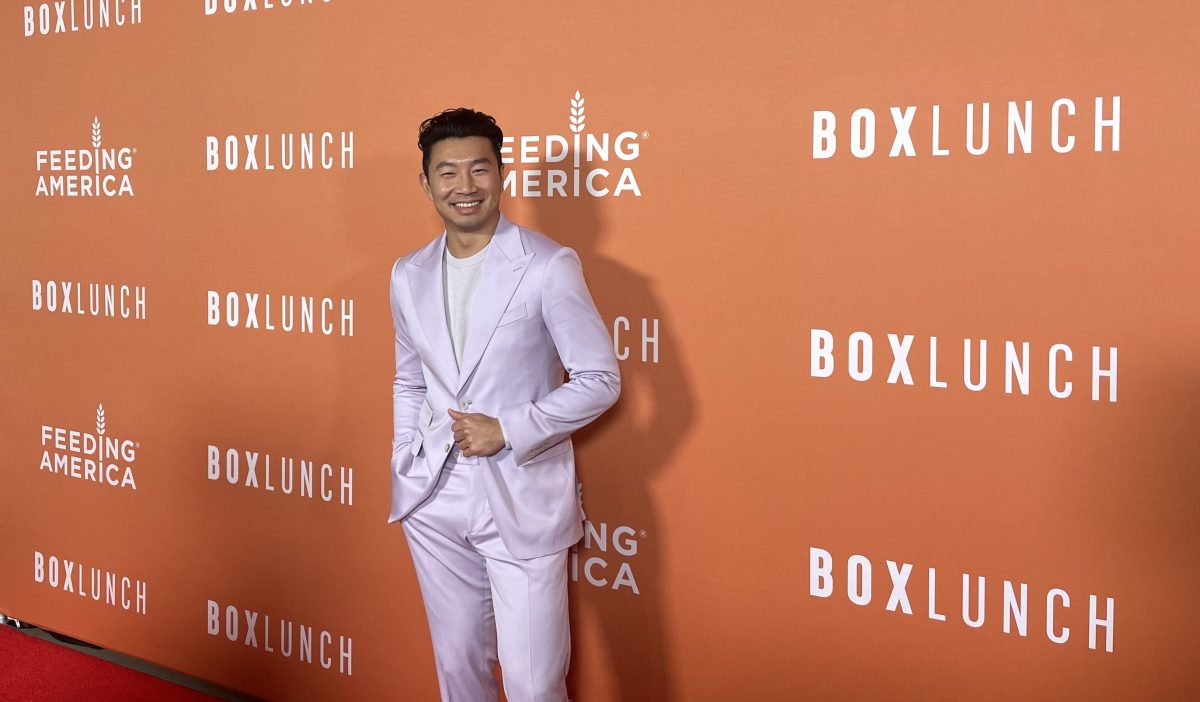 Simu Liu on the red carpet at the 2022 BoxLunch Holiday Gala.