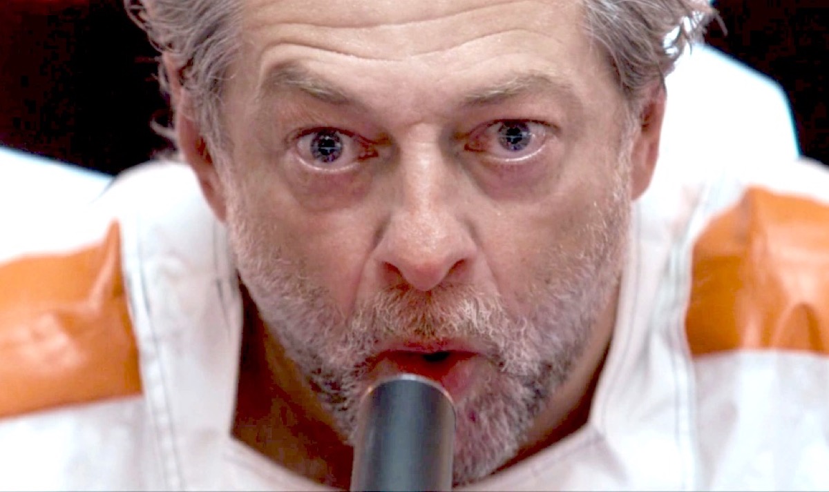 Kino (Andy Serkis) speaks into a microphone in Andor.