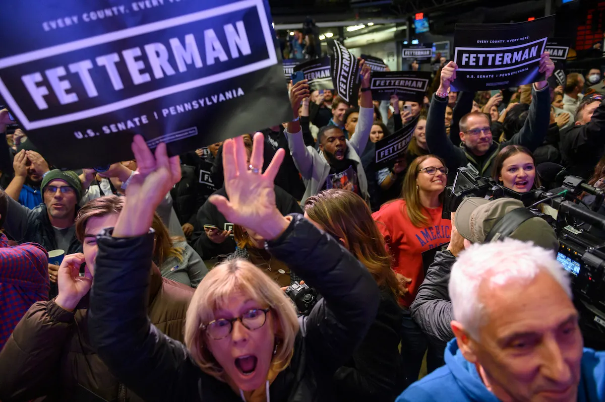 Supporters cheer during an election night event for Democratic Senate candidate John Fetterman