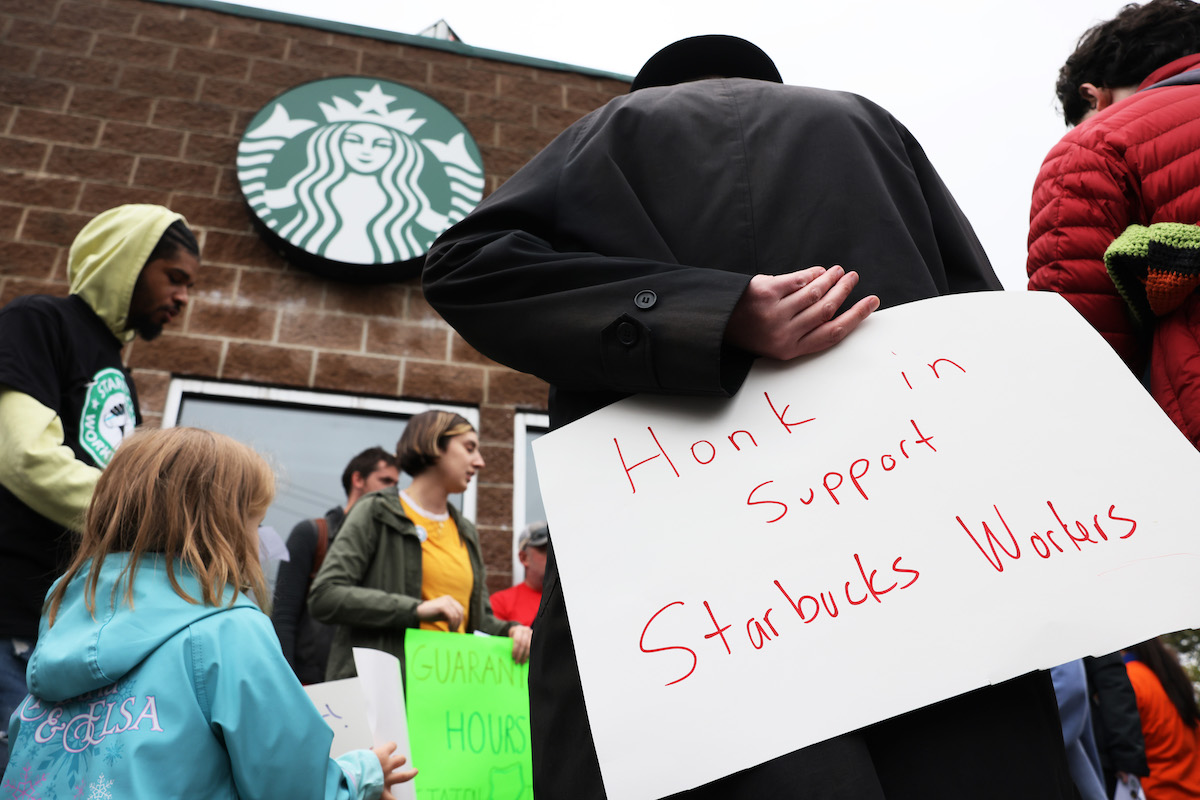 Starbucks workers rally in favor of unionization.