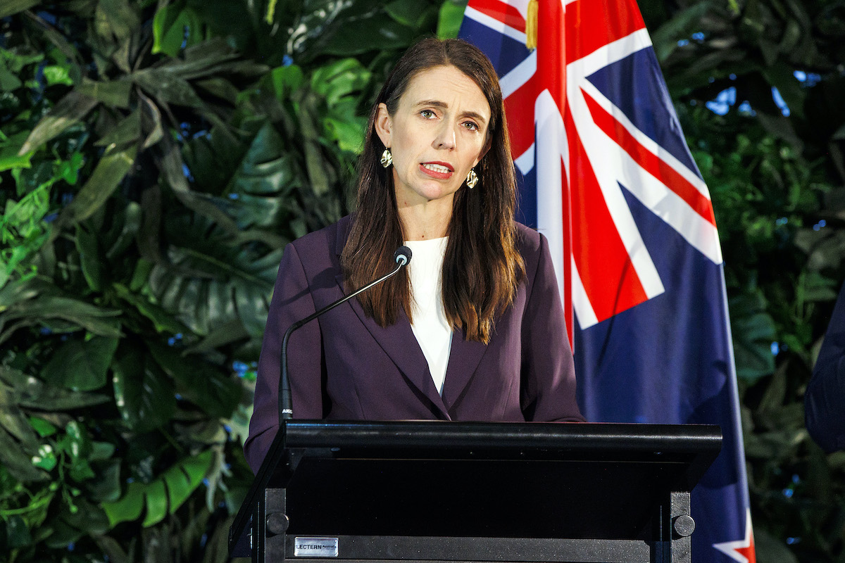 New Zealand Prime Minster Jacinda Ardern frowns while speaking at a press conference