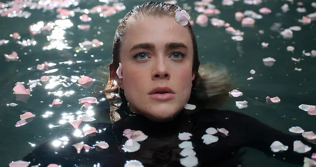 Melissa Roxburgh is covered in petals as Michaela Stone in 'Manifest' season 4