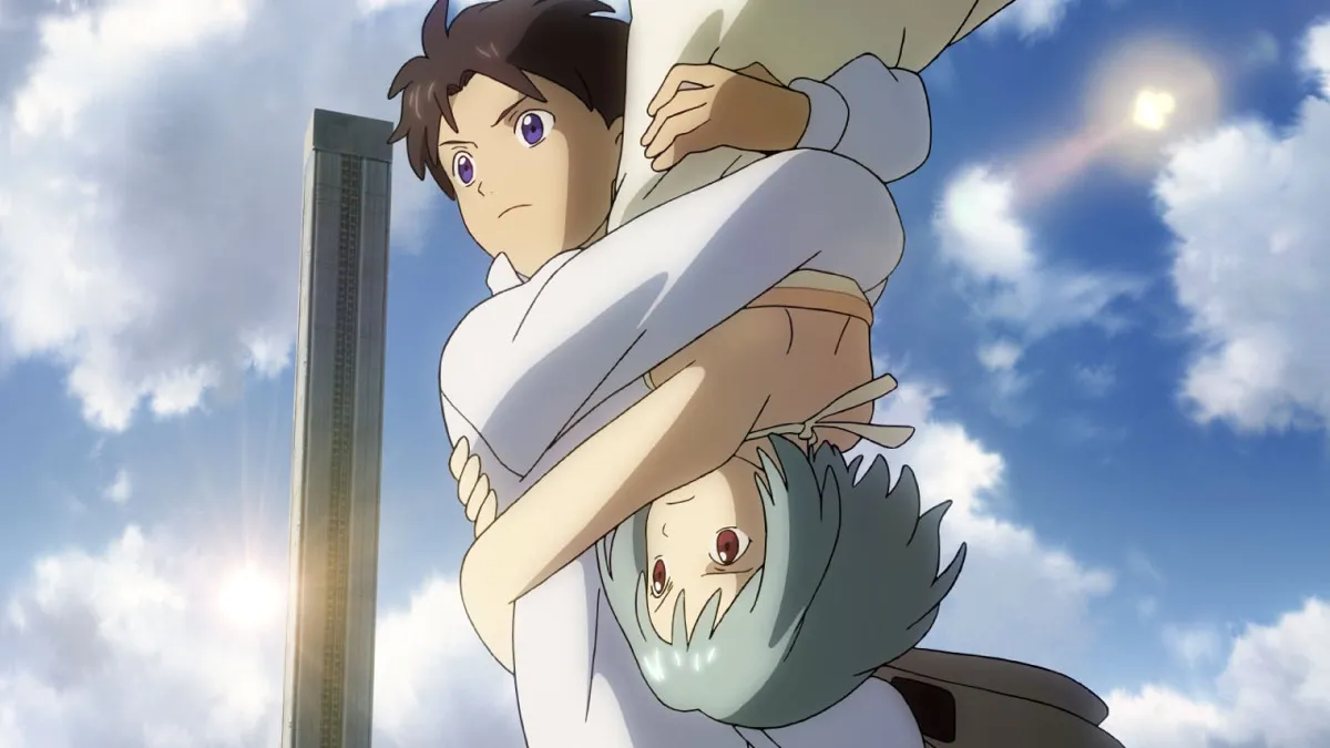 A boy and a girl hold on to each other tightly, the girl is upside down because gravity is reversed for her in "Patema Inverted"