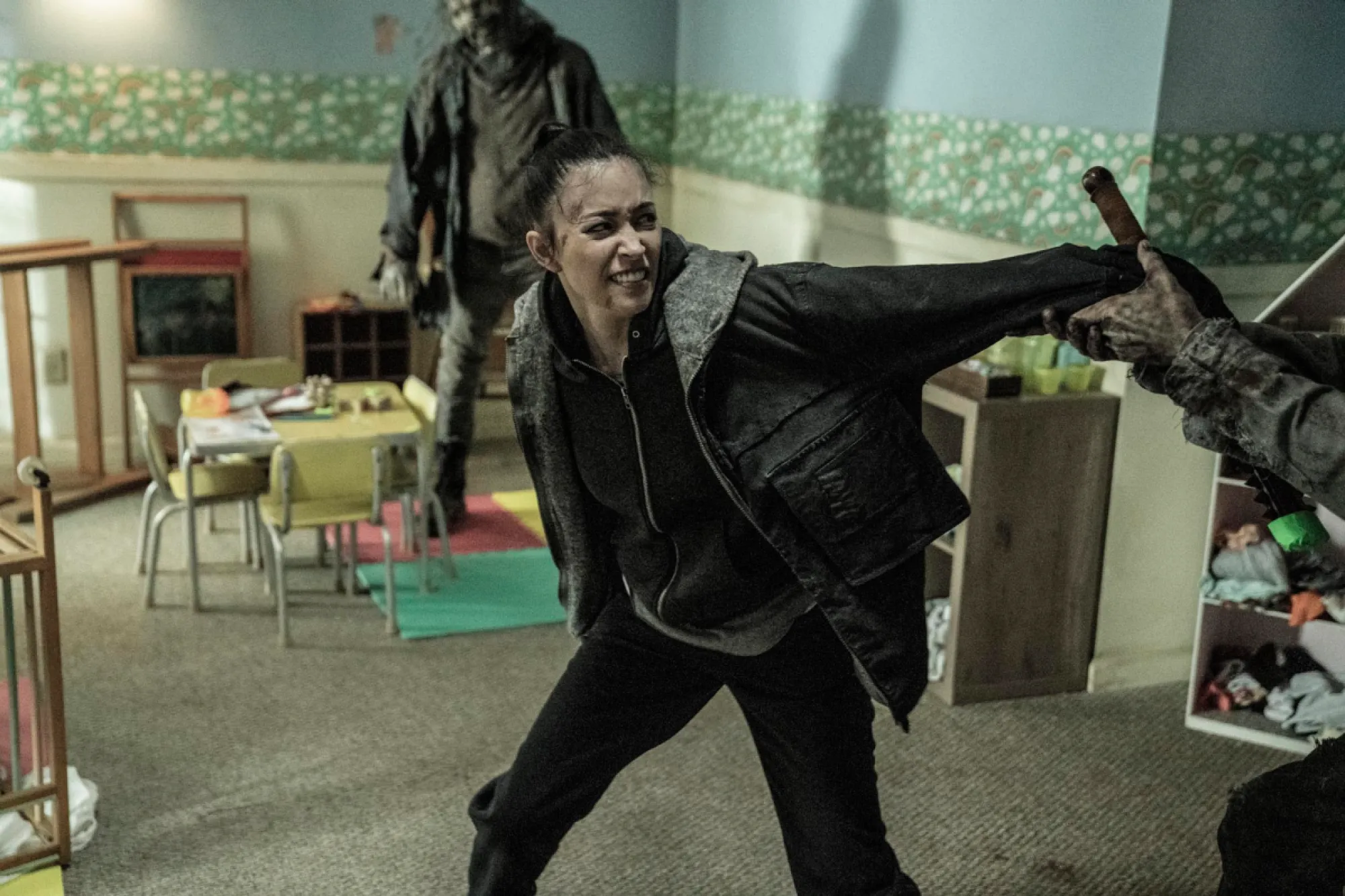 Rosita fighting walkers in The Walking Dead series finale