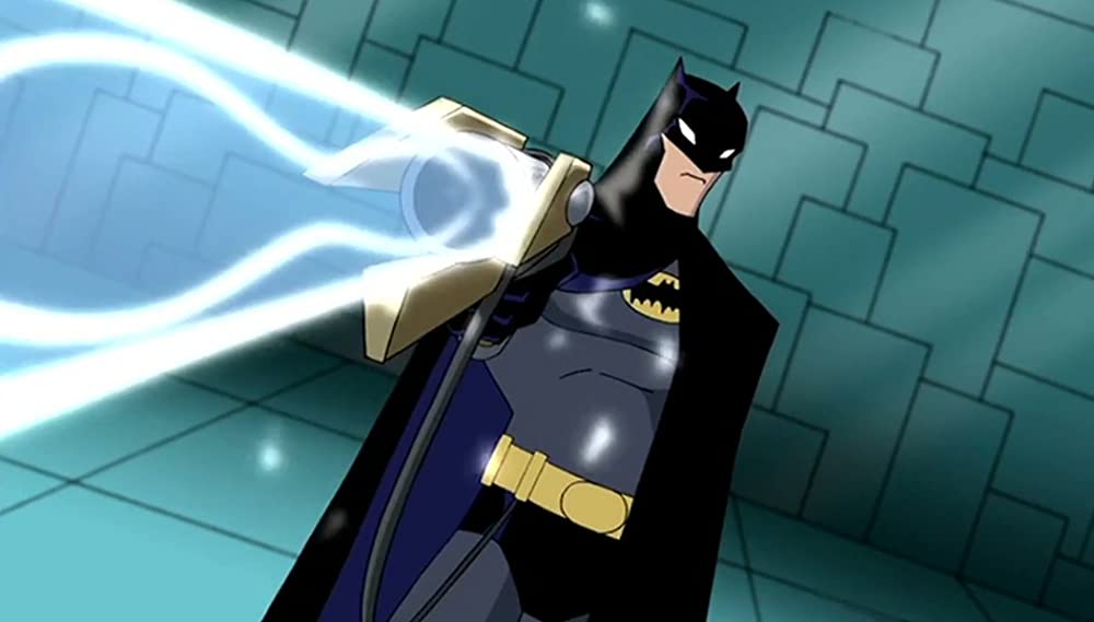 Animated Batman firing a weapon.