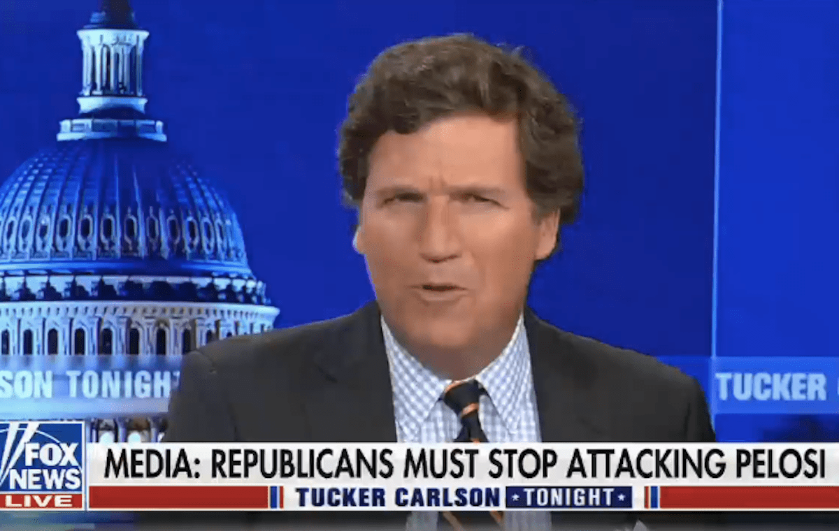 Tucker Carlson makes a mocking face on his Fox News show above a chyron reading "Media: republicans must stop attacking Pelosi"