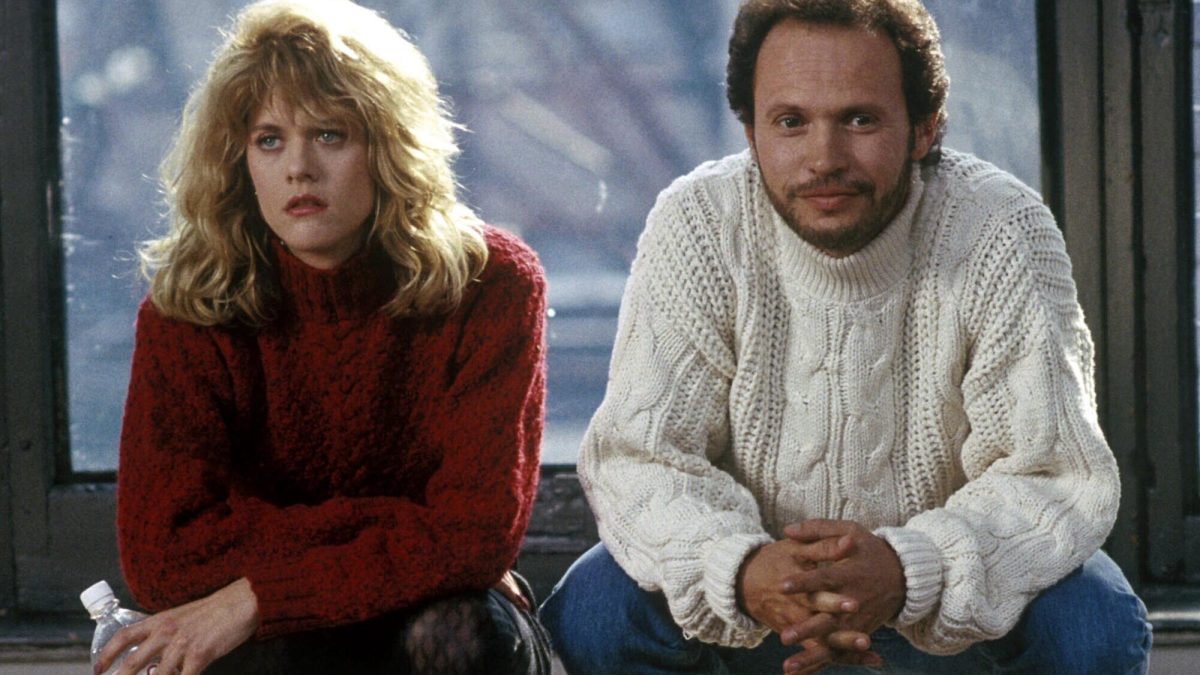 Meg Ryan and Billy Crystal crouching in When Harry Met Sally