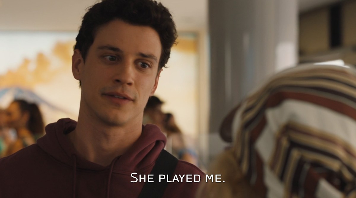 Albie realizes he just got played in 'The White Lotus.' The closed caption reads, "She played me."