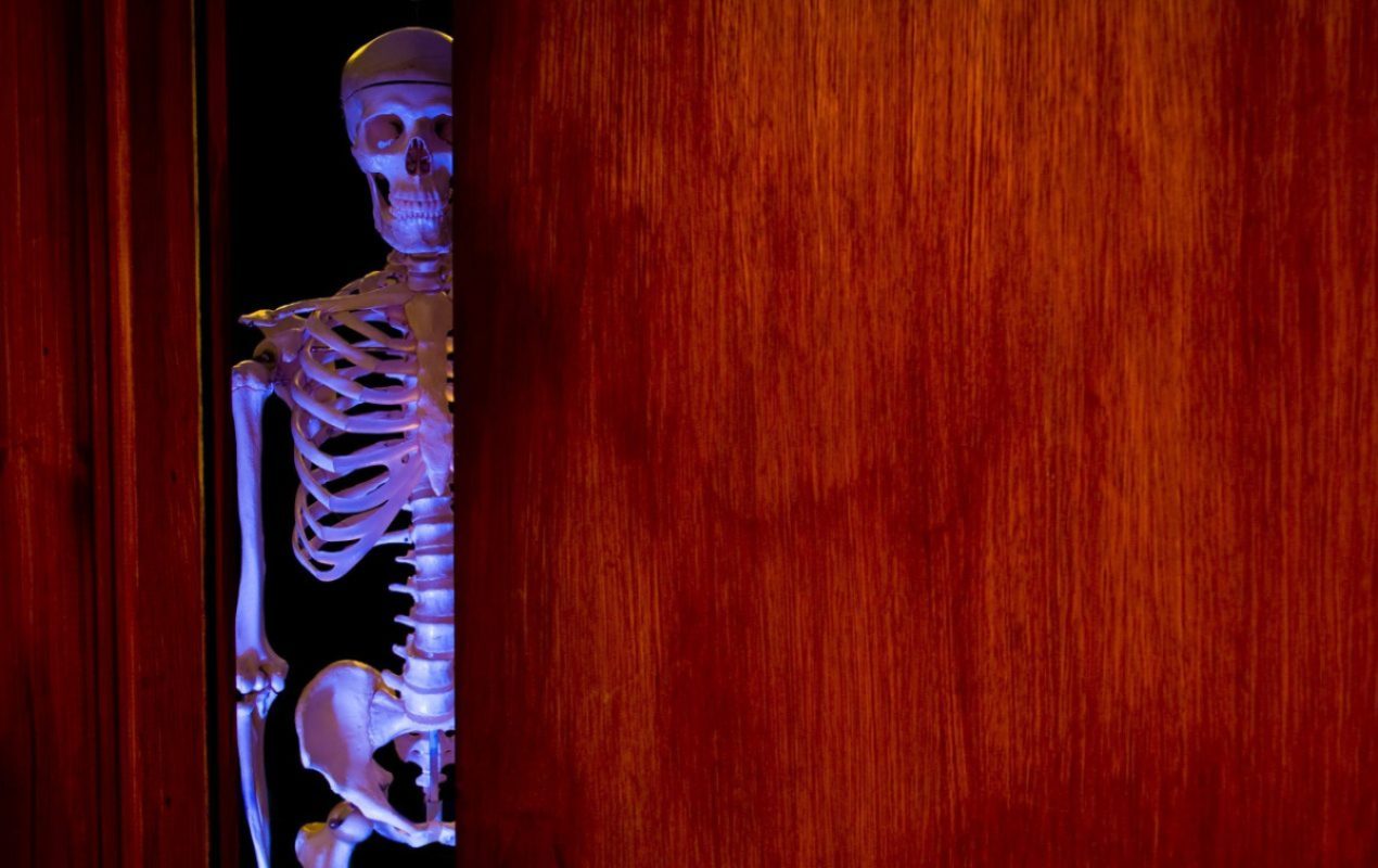 Skeleton peeking out of a closet. Image: SamBurt.